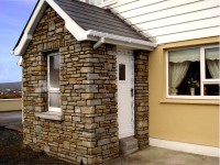 New stone fronted extension & balcony by Pat Harkin Stonework & Restorations, Donegal, Ireland